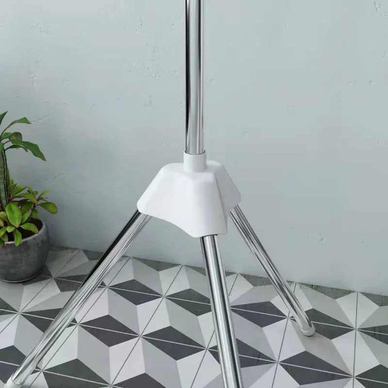 Three-layer stainless steel mobile drying rack with split plastic clips for socks, pants, and ties