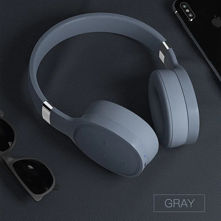Wireless Bluetooth headset in black, blue, grey, and white colour options showing over-ear design.