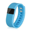 Ordinary bracelet pedometer showing digital display on a coloured plastic and ABS wristband.