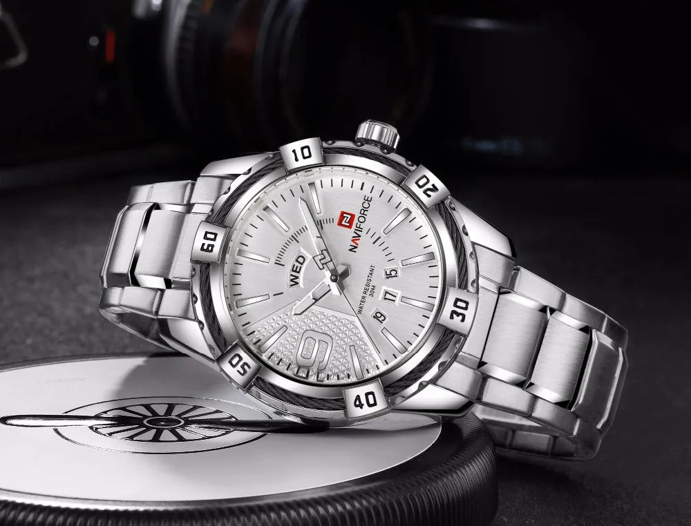 Men's waterproof quartz watch with silver alloy case, stainless steel strap, 46mm round dial and world time display.