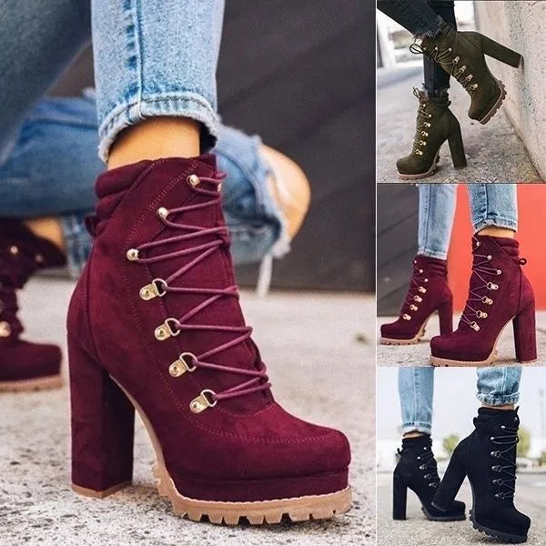 Women's suede high heel ankle boots in army green with thick heel, round toe, rivet details, and a belt buckle.
