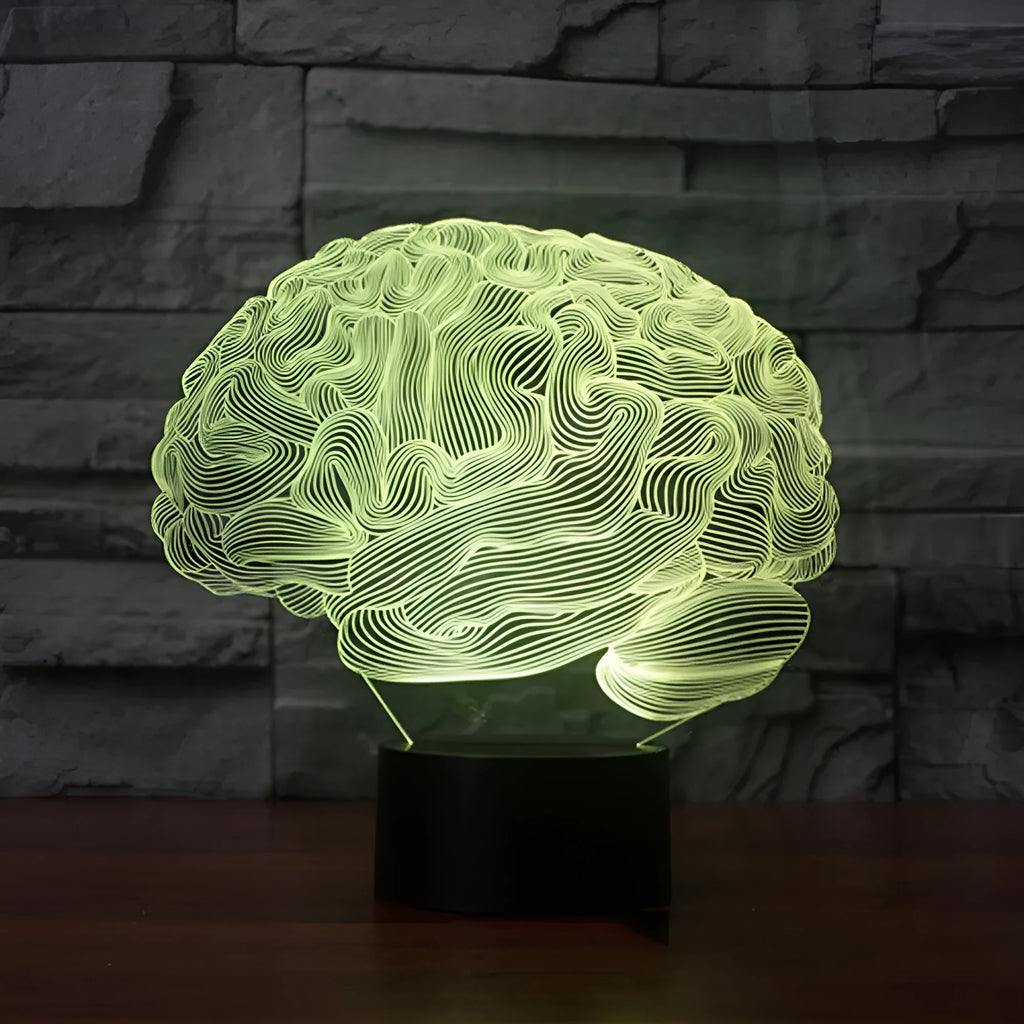 LED 3D acrylic illusion desk lamp with colourful remote control on a wooden table