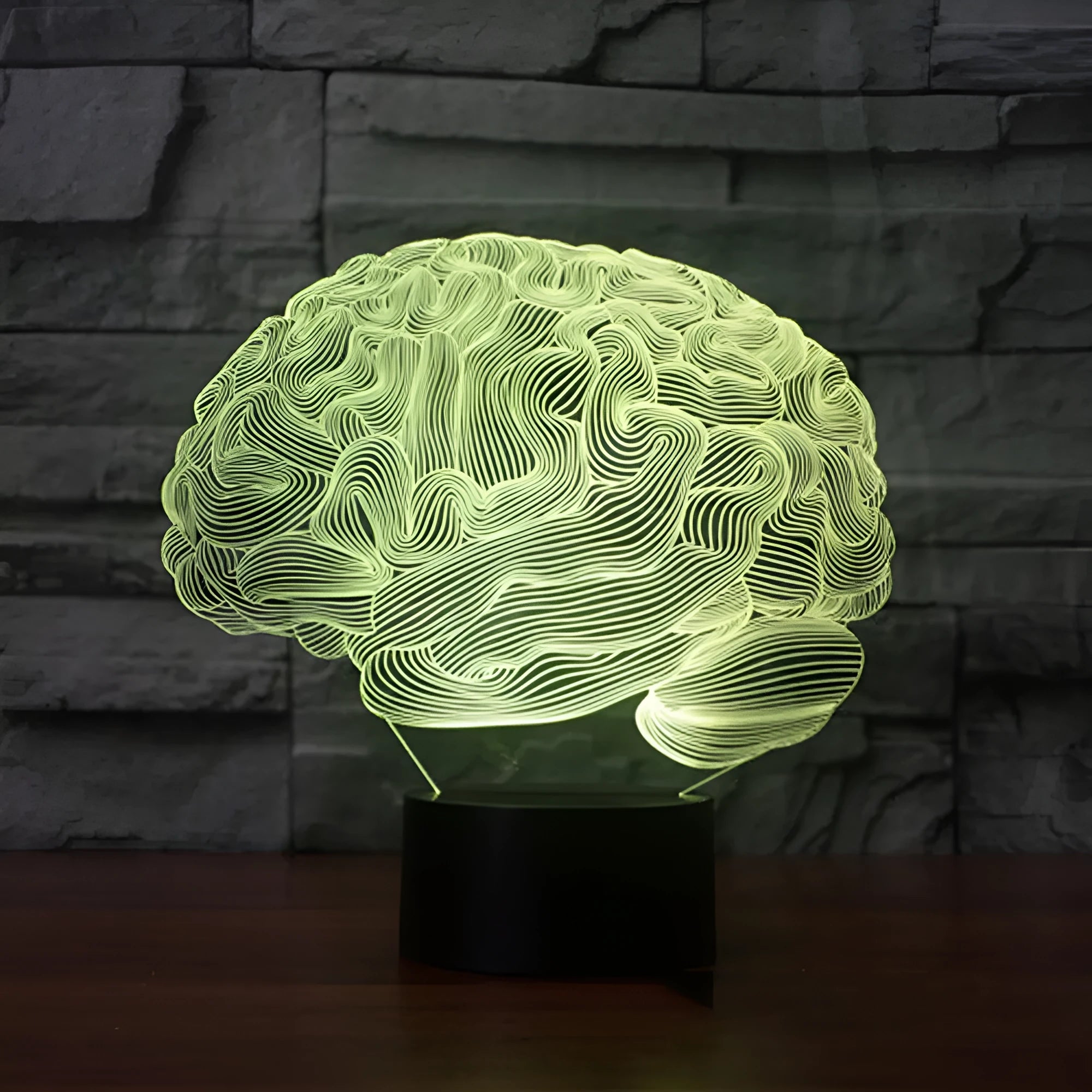 LED 3D acrylic illusion desk lamp with colourful remote control on a wooden table
