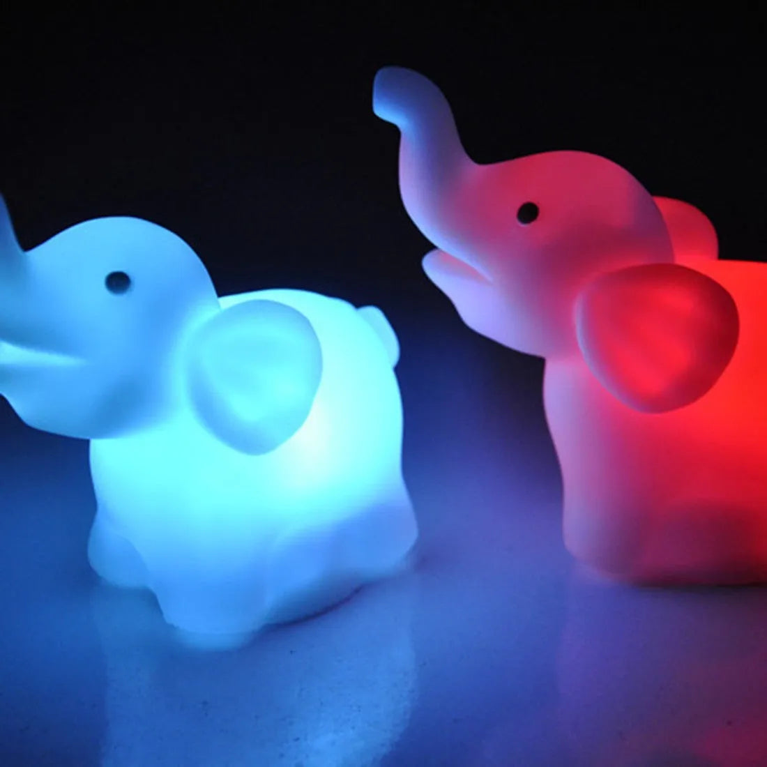 Elephant night light, vinyl, 8x8.8x4.5cm, with 7 colour changing slow flashing battery-powered light