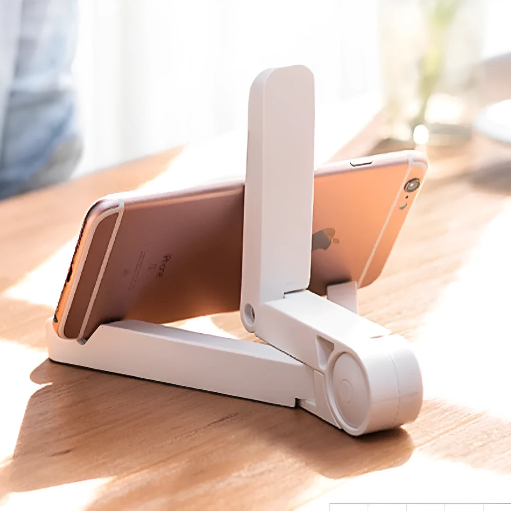 Black foldable tablet holder supporting a smartphone in landscape mode on a desk