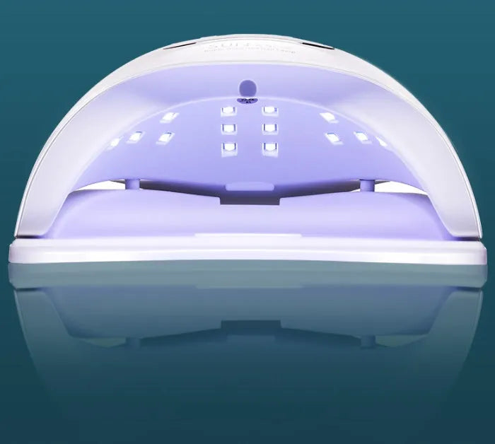 White portable UV LED nail dryer lamp with digital timer display and light-up chamber