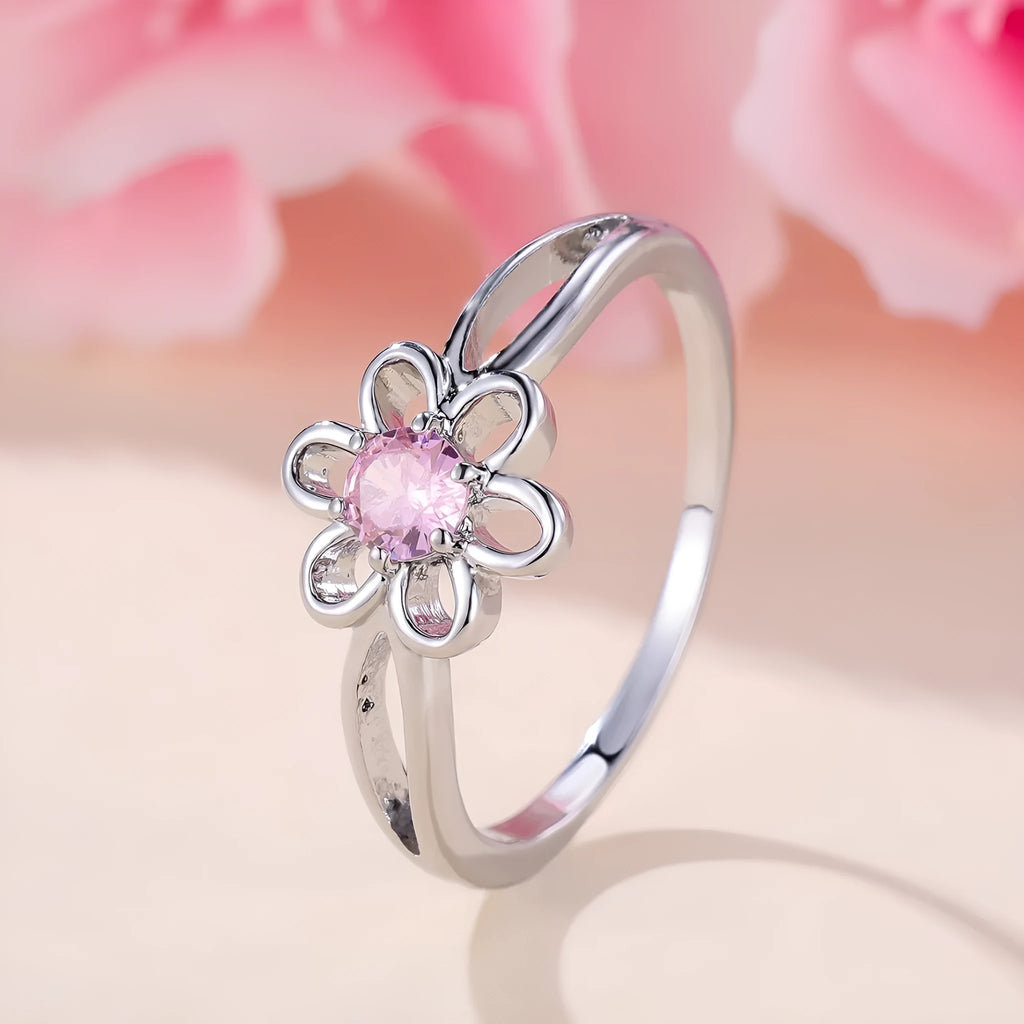 Copper fashion ring with hollowed flower design in platinum pink diamond colour