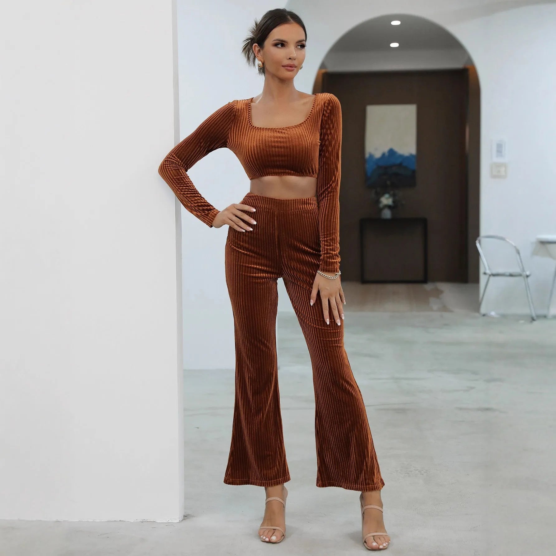 Caramel-coloured long sleeve sweater and trouser casual set on hanger