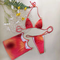 Tie-dye gradient solid colour three-piece halter bikini swimwear set with top, pants, and skirt.