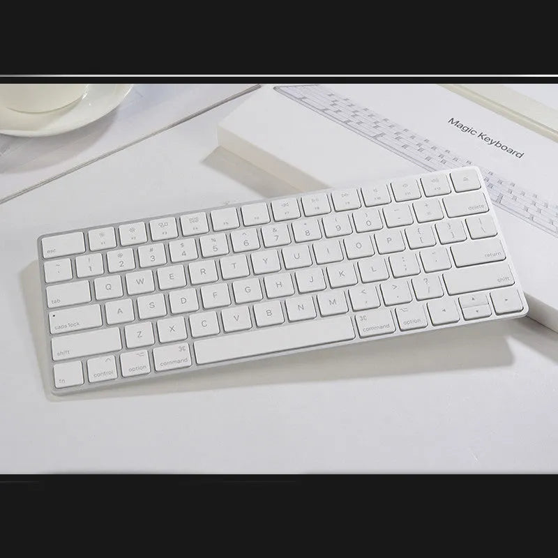 White Apple G6 Bluetooth wireless keyboard with ultra-thin metal construction and multimedia keys