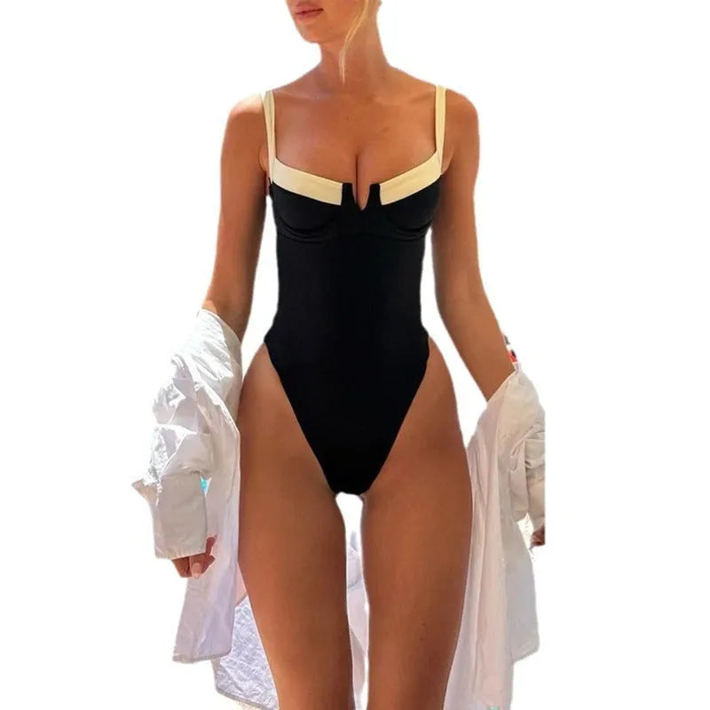 Women's contrast colour one-piece swimsuit bikini in black or red, polyester with nylon lining, briefs style, sizes S to XL.