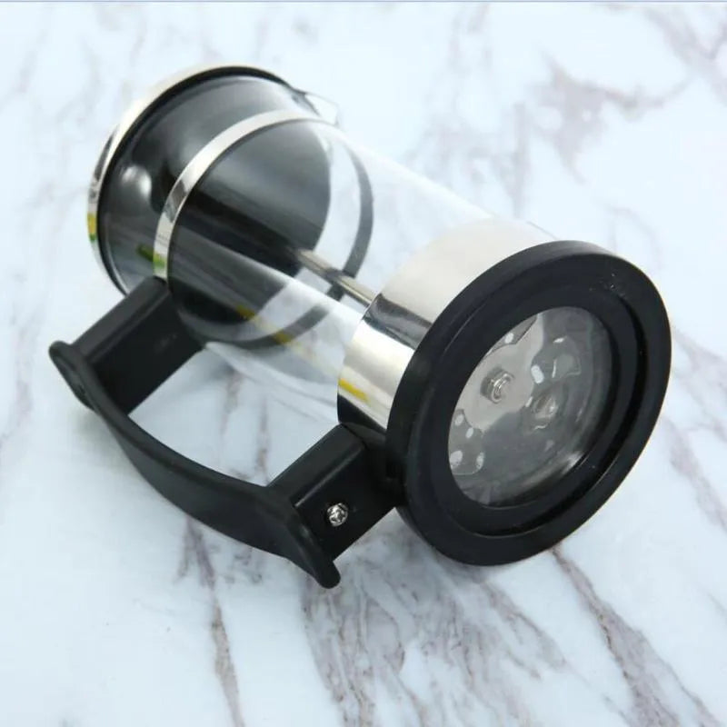 Small glass pour-over coffee maker with stainless steel filter, 350ml capacity.