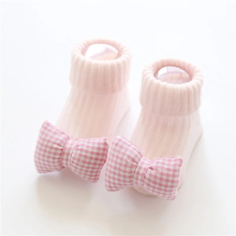 Cotton baby floor socks with anti-slip soles in animal designs for infants and toddlers