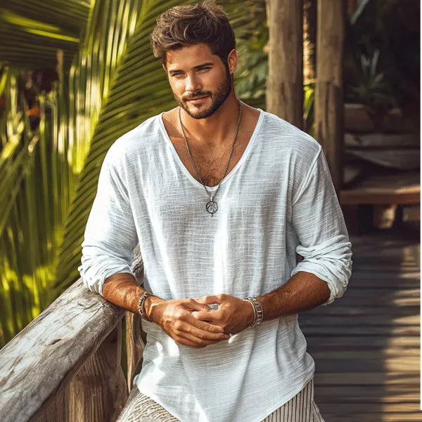 Beige slim-fit long-sleeved V-neck t-shirt laid flat, showing its hemp-blend fabric texture.