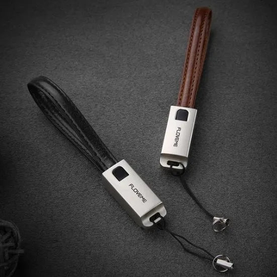 Leather braided iPhone charging cable with zinc alloy connectors in black, brown, or red colour options