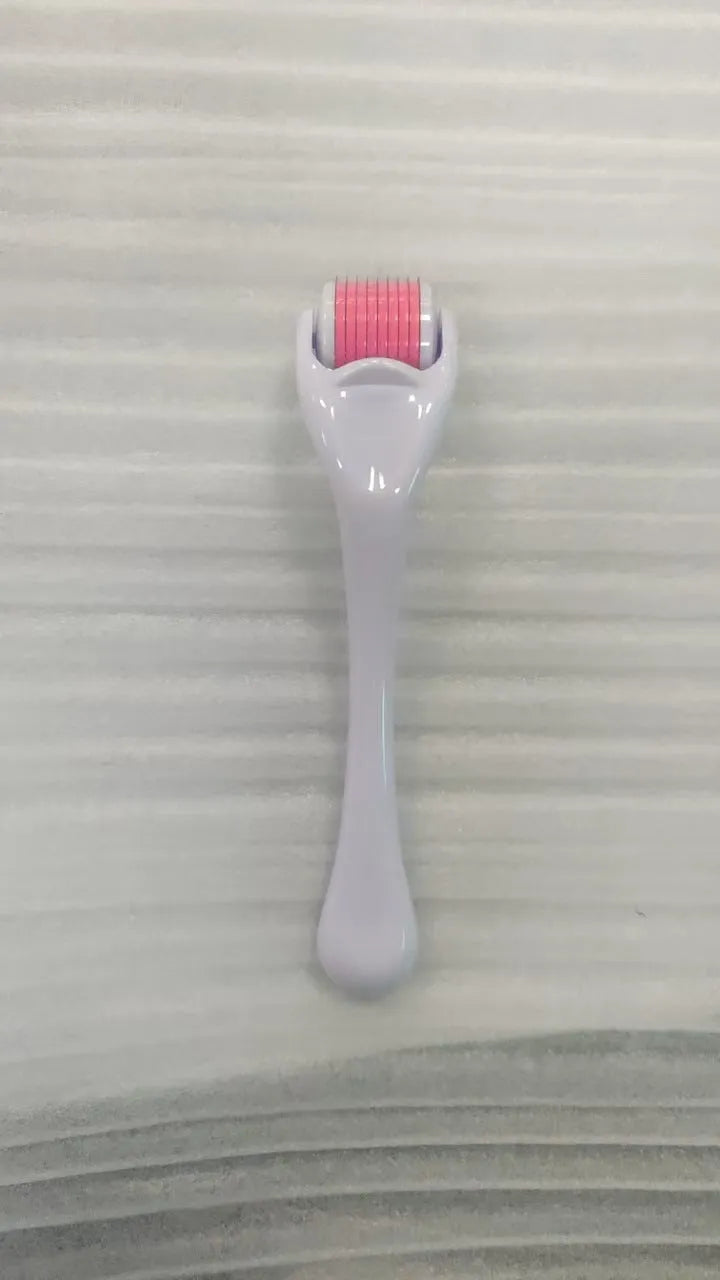 540 Micro Needle Roller device with mechanical font size display showing needle specification