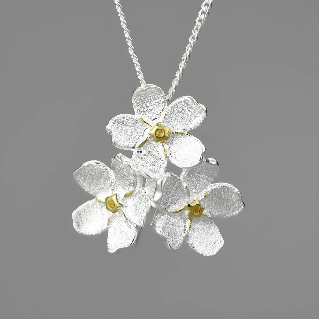 Hand-designed Myosotis Sylvatica silver floral pendant in pastoral style with electroplated finishes