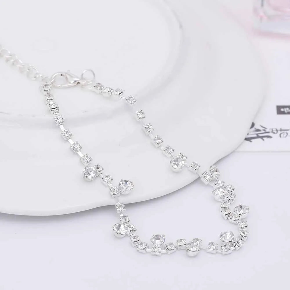 Silver tone water drop anklet with tassel and inlaid stone detail, 24+5 cm women's anklet