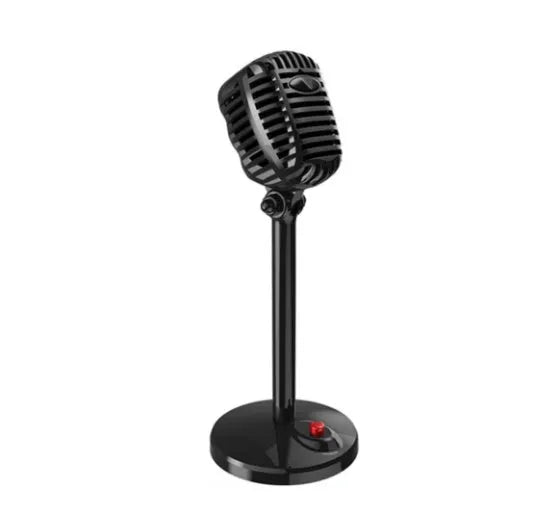 Black USB computer microphone with adjustable stand on desktop for recording and podcasting