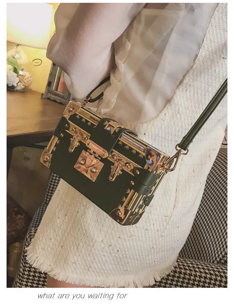 Black hard case PU leather women's shoulder bag with flap closure and cross-body strap