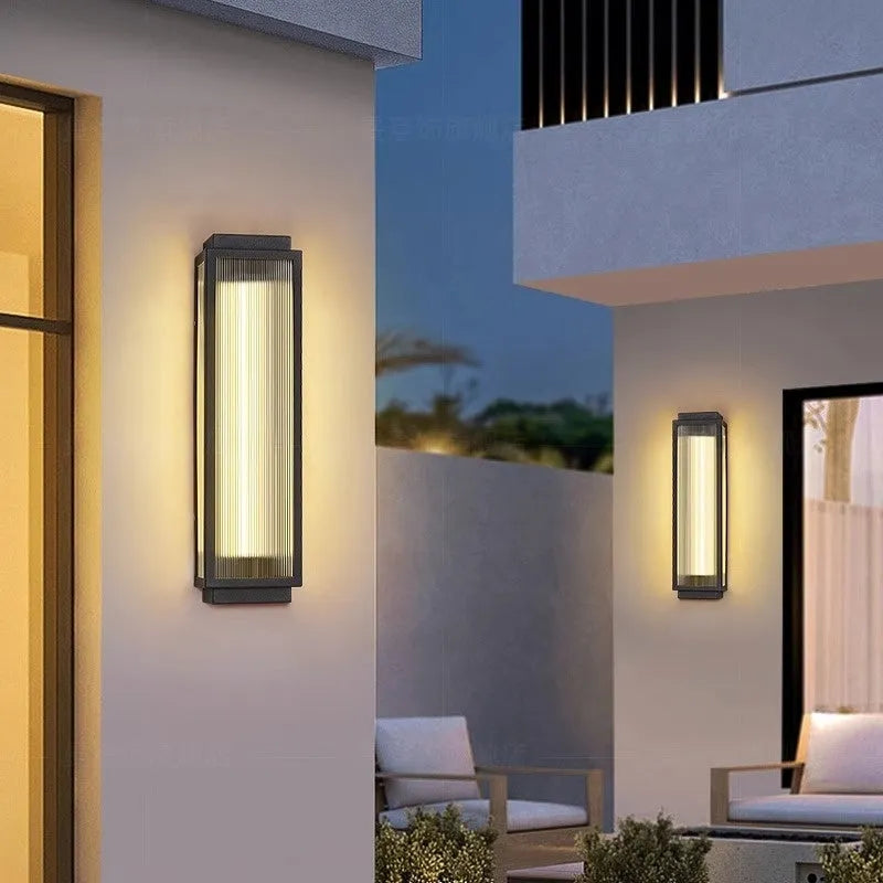 Stainless steel outdoor wall lamp for garden or courtyard mounting.