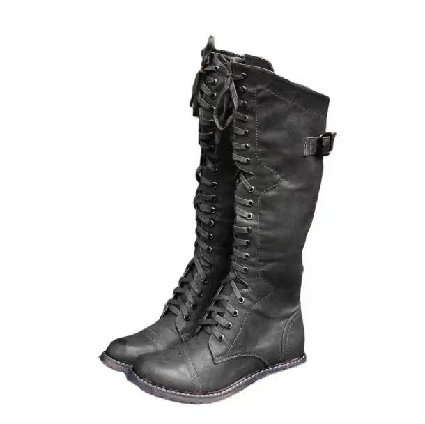 Women's black chunky heel high leg ankle boot with round toe and low rubber sole
