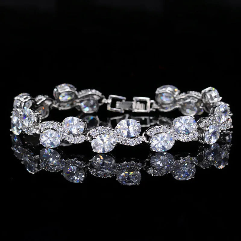 Geometric simple style gold plated bracelet with AAA zircon stones on a white background.