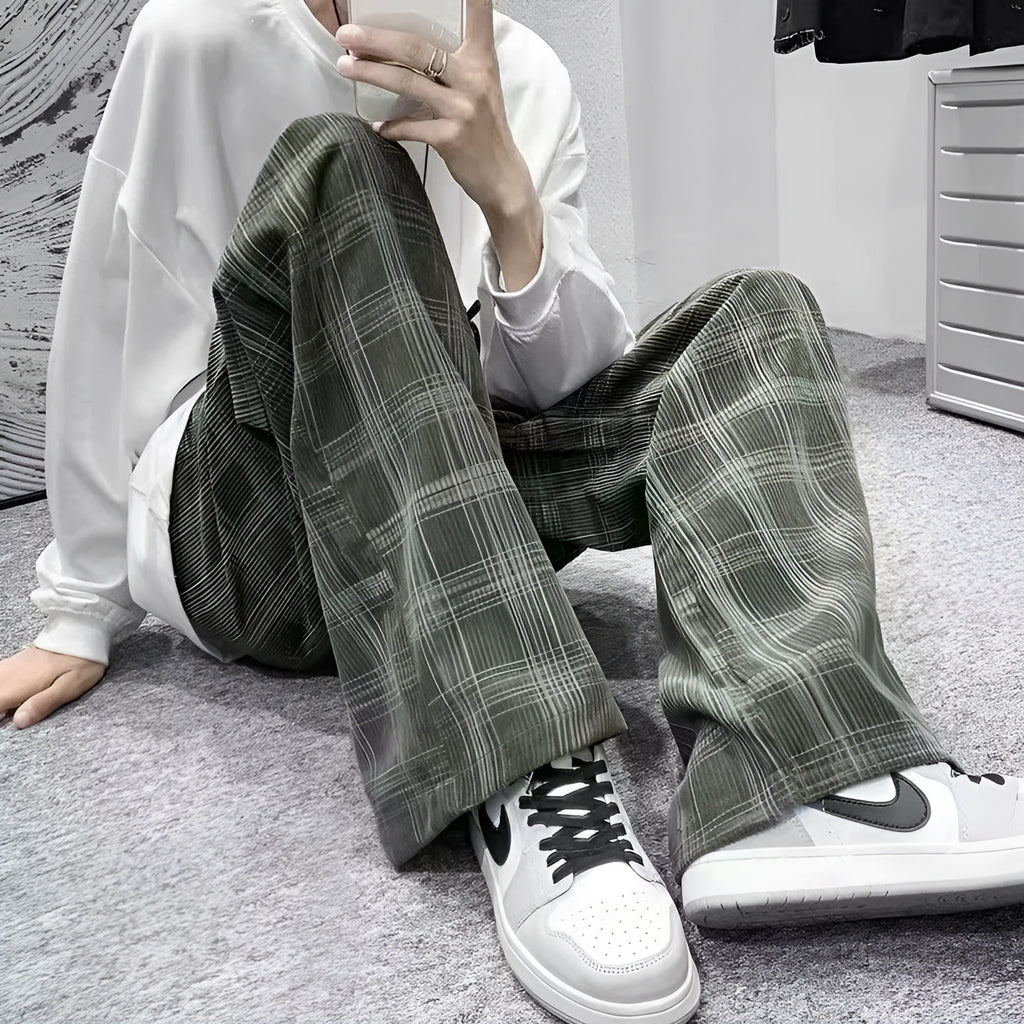 Loose-fit straight-leg plaid trousers in black and green colour options