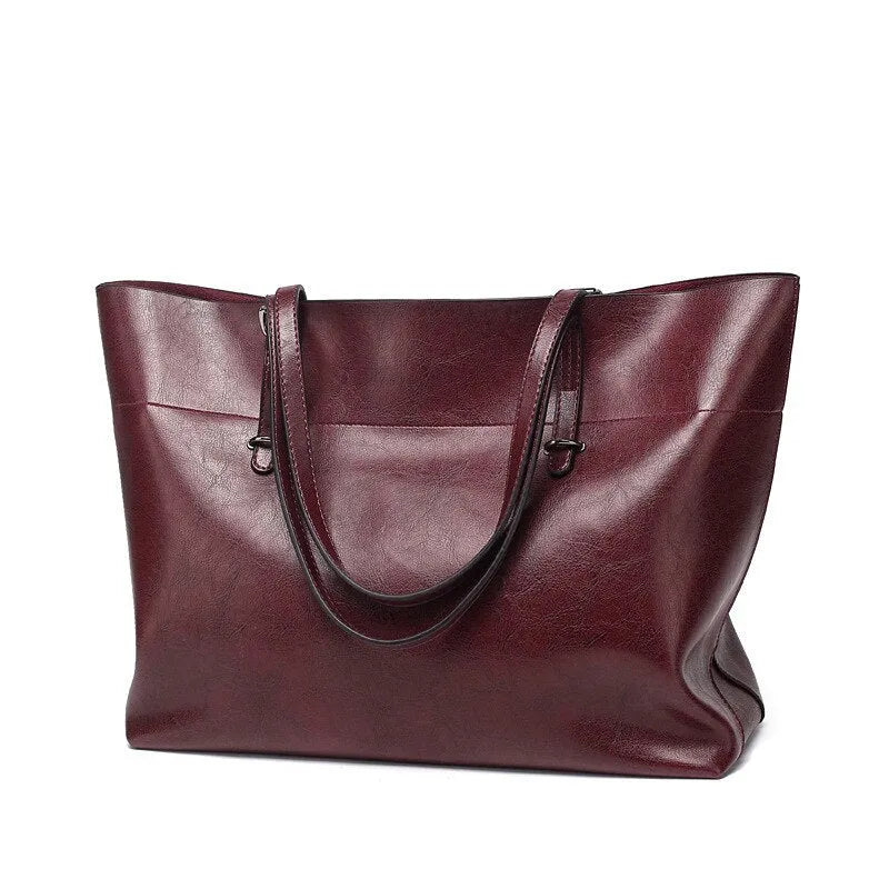 Waxed cowhide leather handbag in cross-section style showing internal compartments and available colour options.