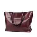 Waxed cowhide leather handbag in cross-section style showing internal compartments and available colour options.