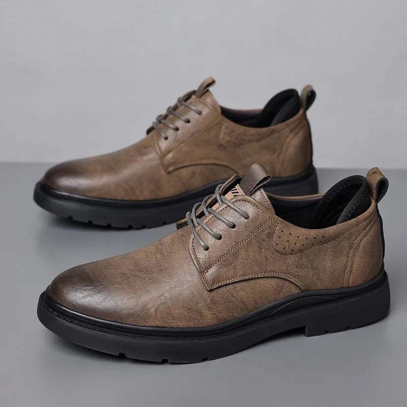 Men's black and brown leather shoes with sewn detailing and rubber sole