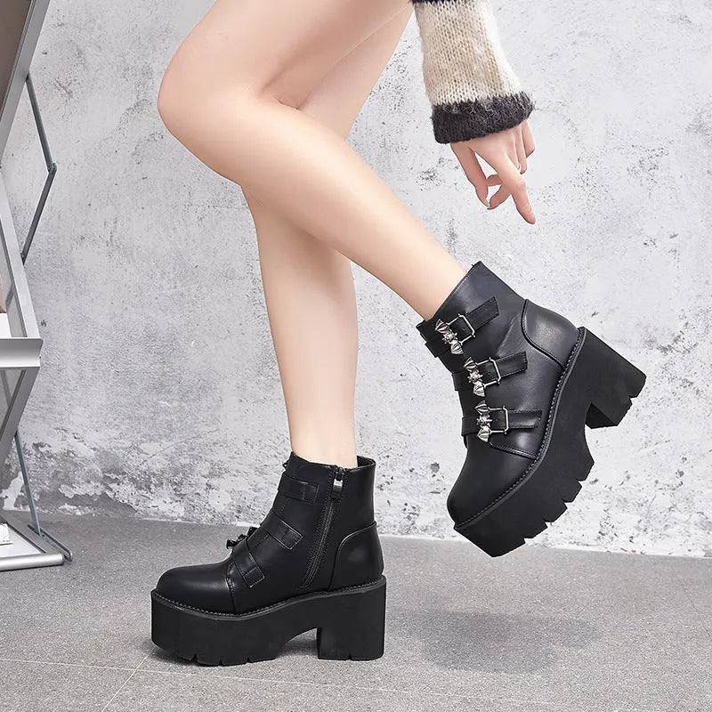Black women's Harajuku punk ankle boots with a bat-shaped buckle and side zipper.