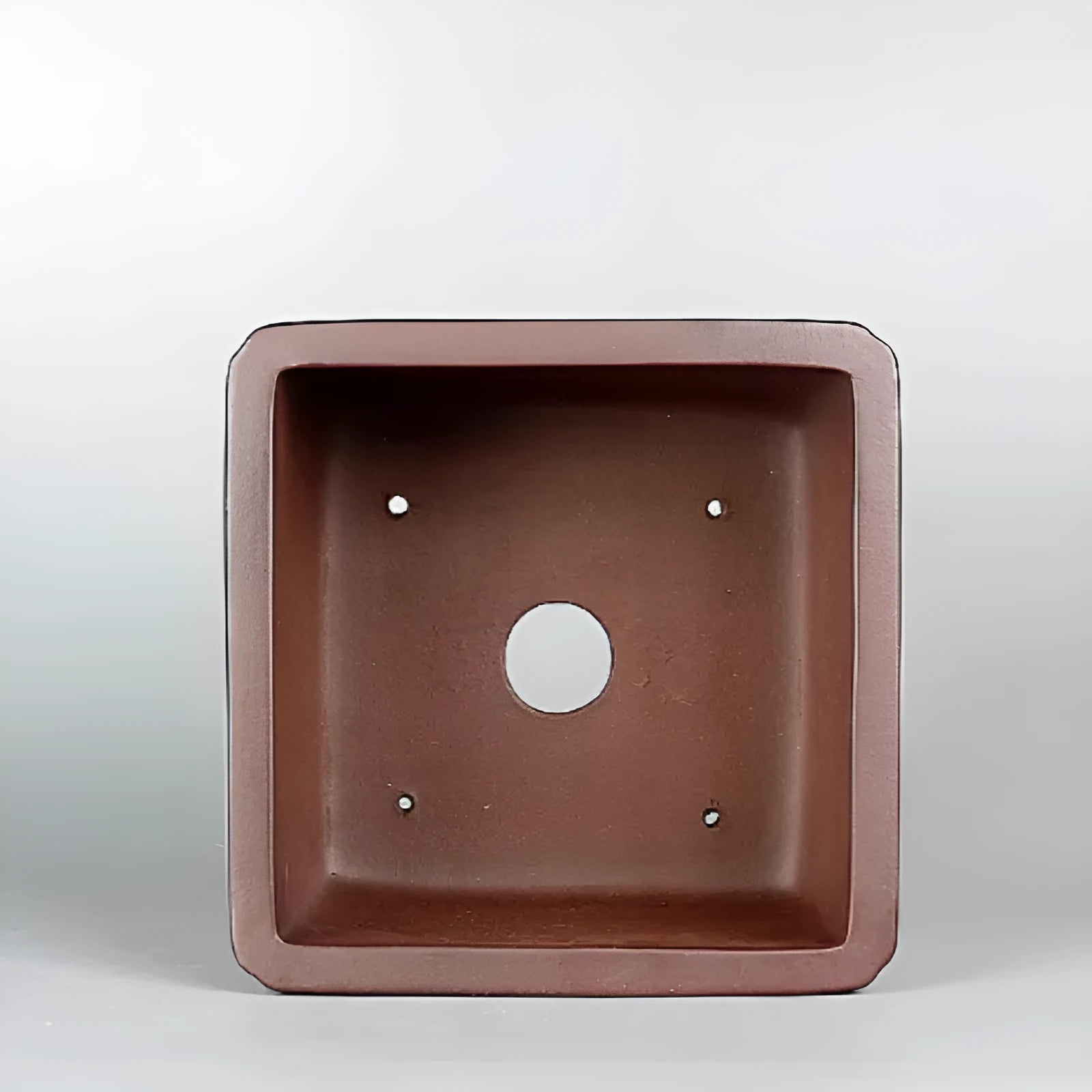 Brown handmade purple clay flower pot with antique style measuring 19cm diameter