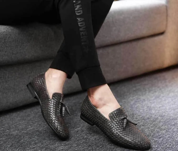 Anyaman men's woven loafers in black with soft sole, side view showing handcrafted weave texture