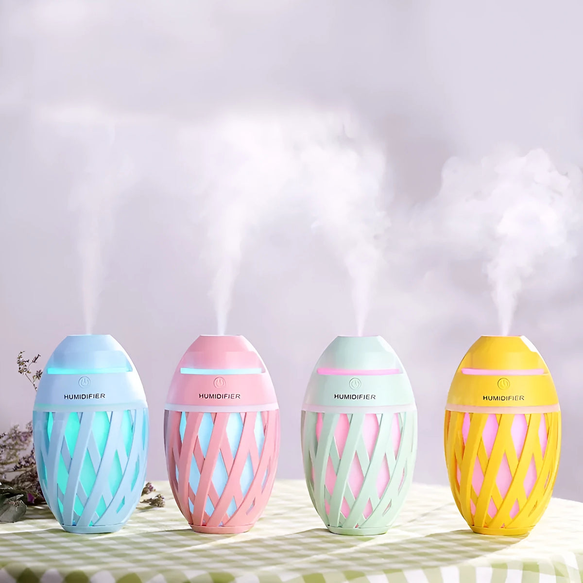 Football humidifier 90 x 90 x 150mm in blue, green, pink, and yellow, made from ABS, PP, and silicone