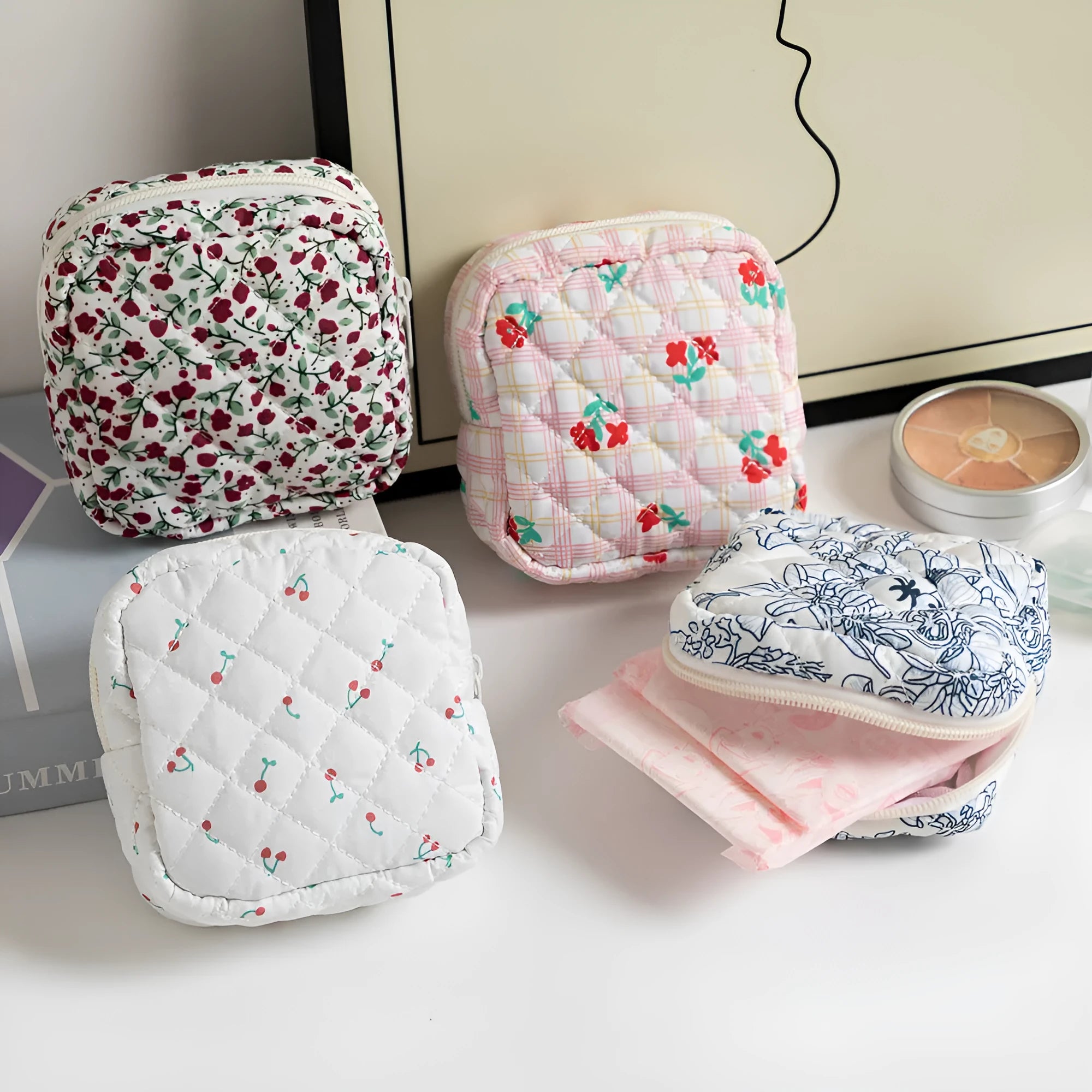 Polyester women's key storage bag with floral pattern choices on white background.