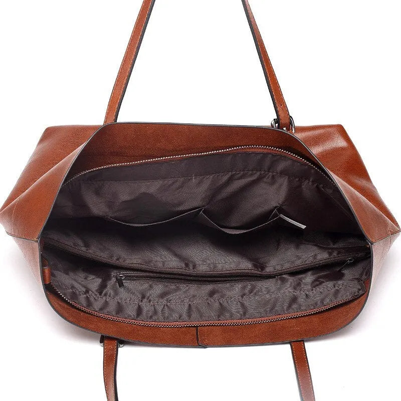 Waxed cowhide leather handbag in cross-section style showing internal compartments and available colour options.
