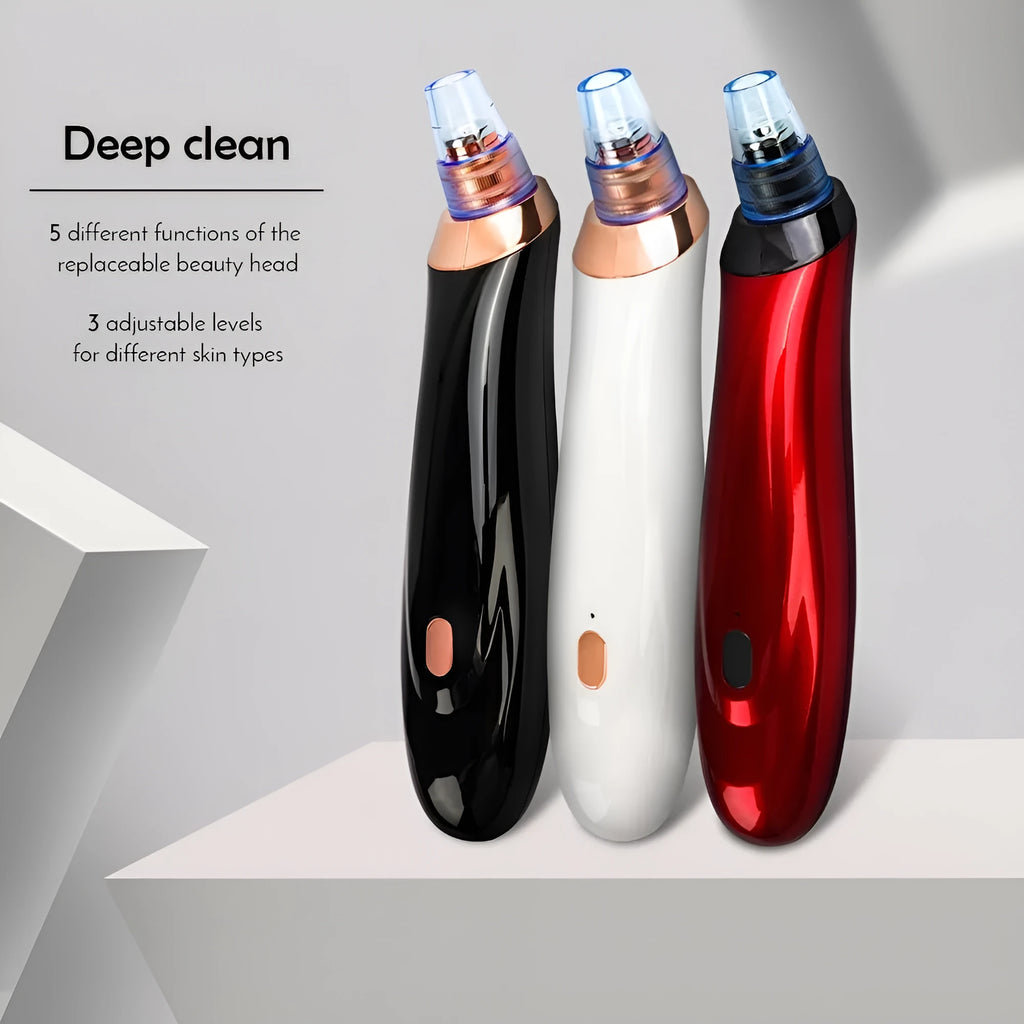 Handheld electric blackhead remover device in black with multiple nozzle attachments.