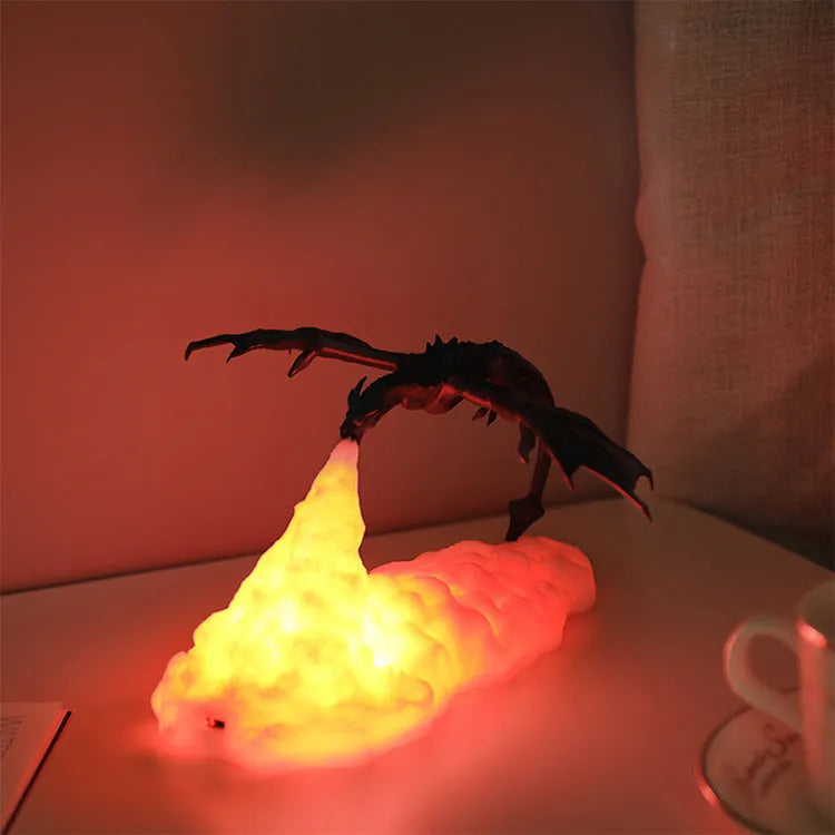 3D printed fire-breathing dragon night light with red glowing effect on a dark surface.