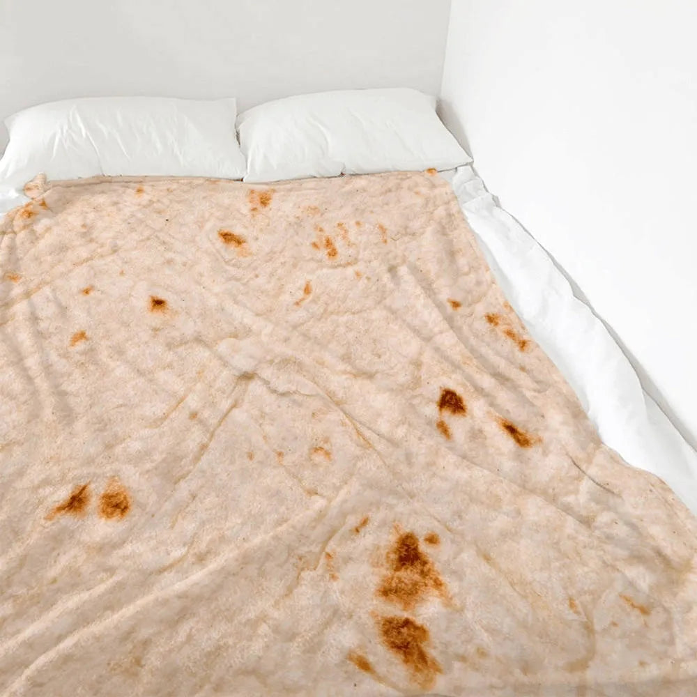 Round coral fleece burrito blanket with food print, shown wrapped.