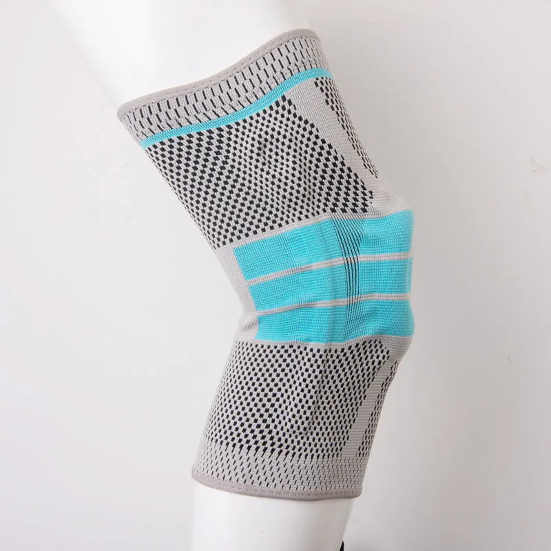 Sky blue elastic fibre knee pads with silicone lining for sports.
