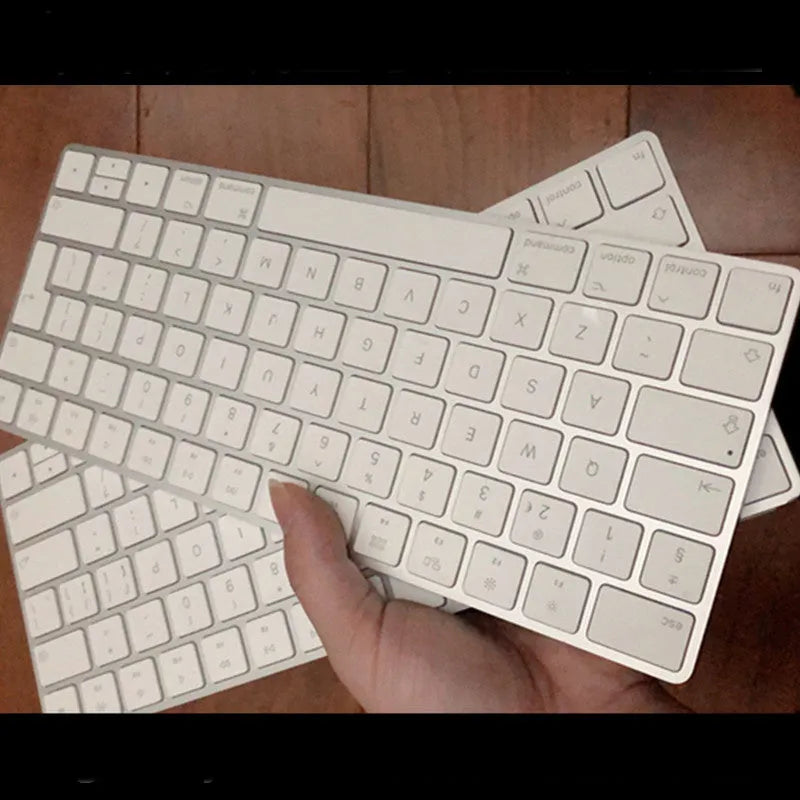 White Apple G6 Bluetooth wireless keyboard with ultra-thin metal construction and multimedia keys