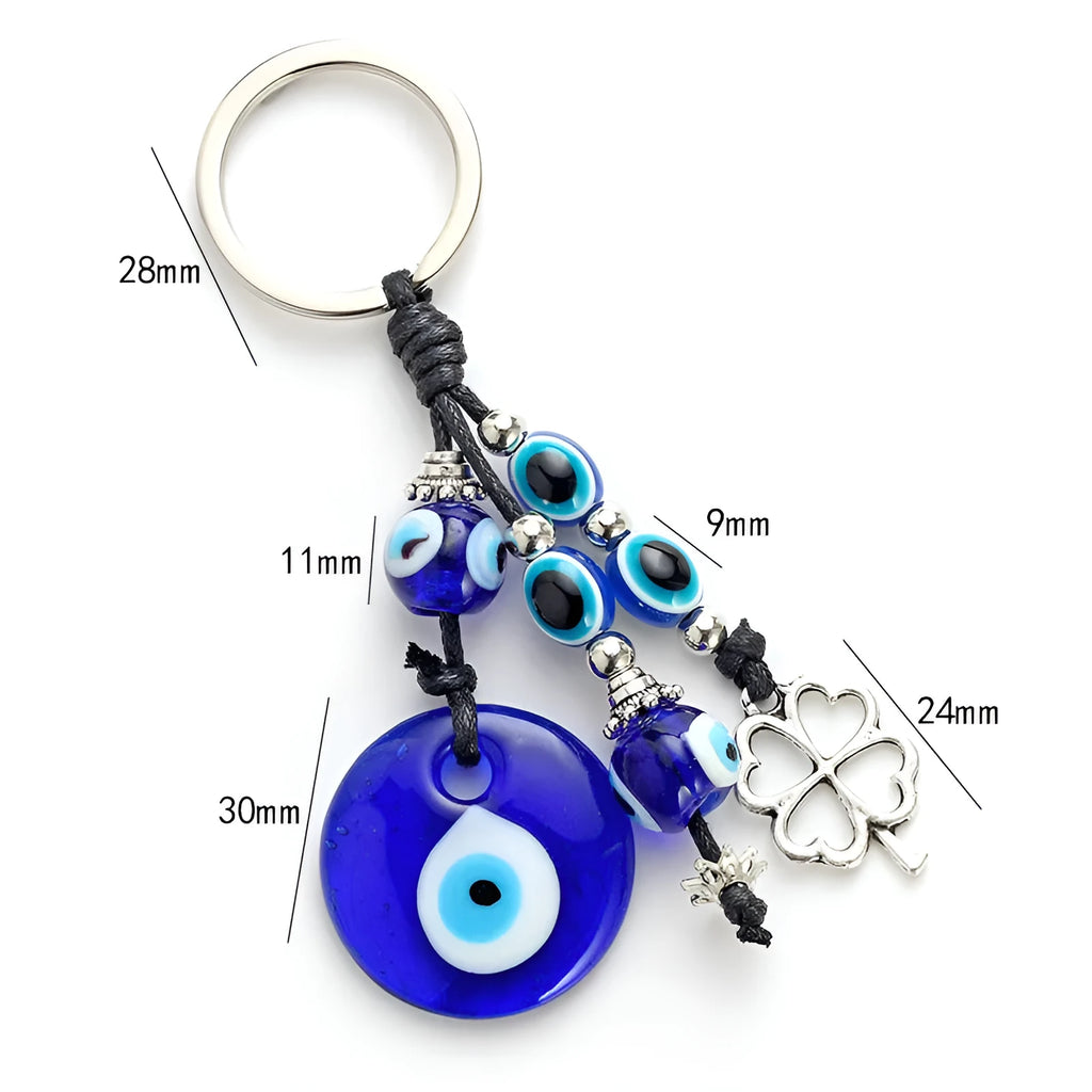 Blue evil eye keychain with metal plant-shaped pendant and unisex keyring design