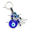 Blue evil eye keychain with metal plant-shaped pendant and unisex keyring design