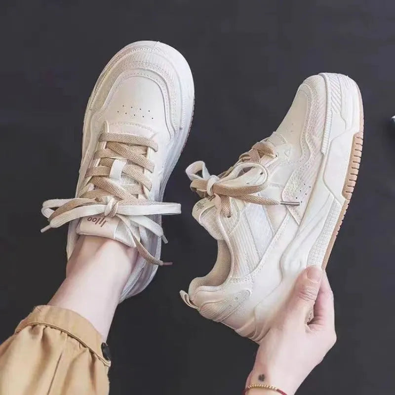 Beige low-top rubber sneakers with height increasing soles and imitation leather lining