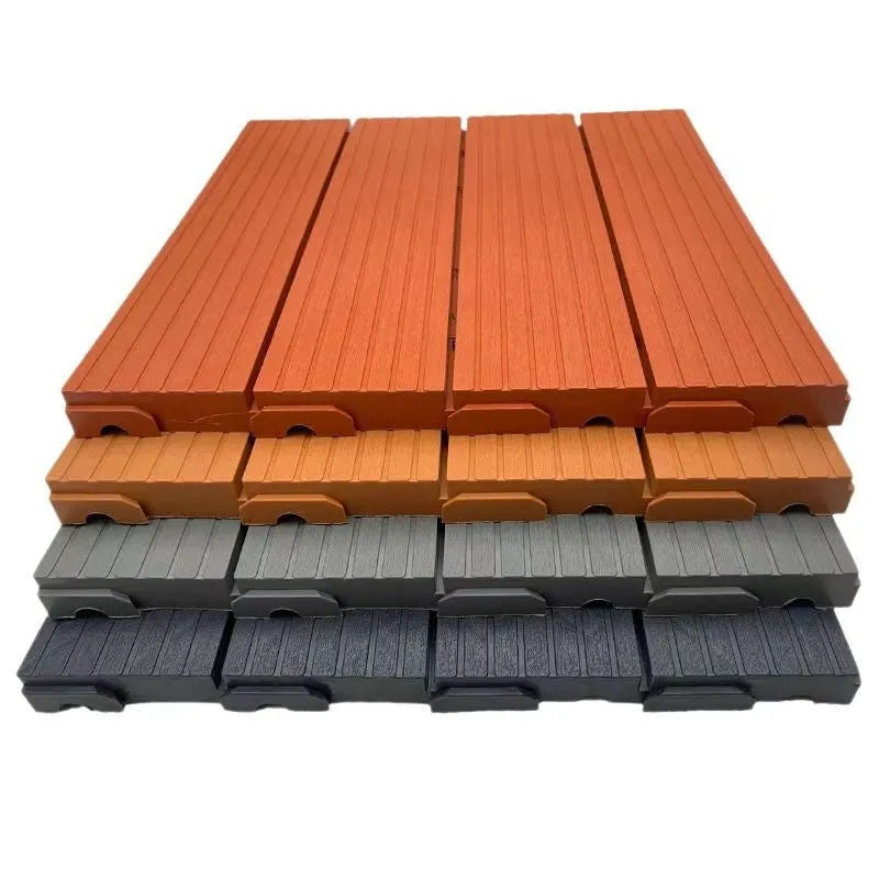 Pack of 10 wood grain style plastic interlocking floor tiles showing non-slip texture