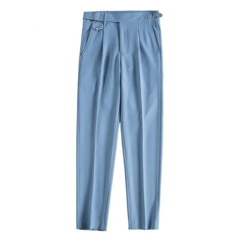 Men's straight-leg casual trousers in solid colours showing straight silhouette and polyester fabric texture