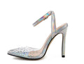 Women's pointed toe stiletto sandals with diamond details on a PVC upper.