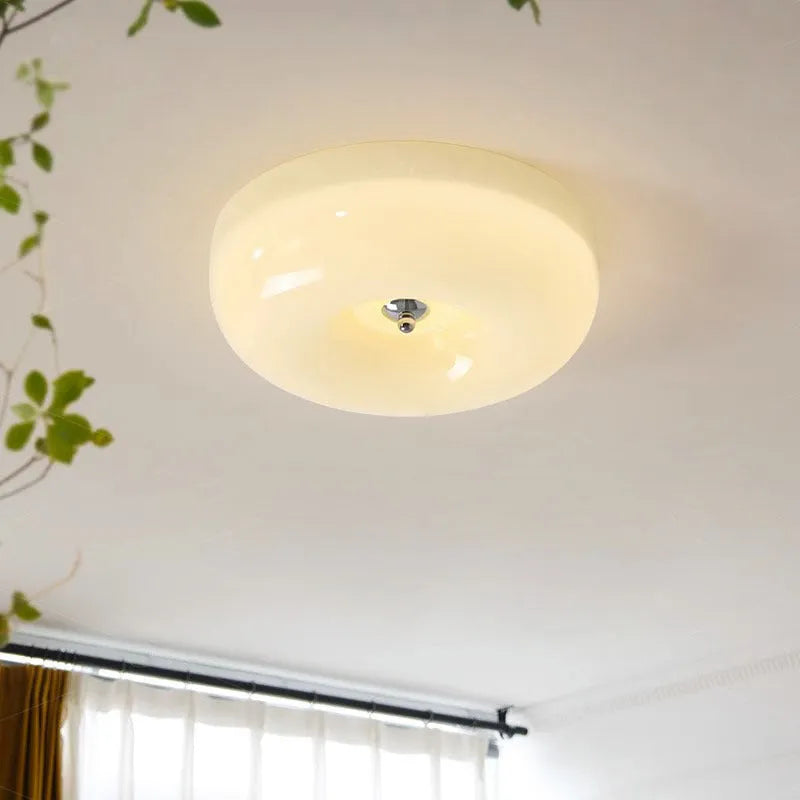 American style cream coloured bedroom ceiling light fixture with three-colour settings.