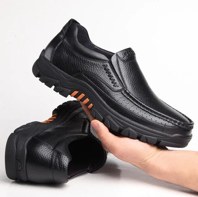 Men's black and brown cowhide leather slip-on business casual shoes with rubber sole.
